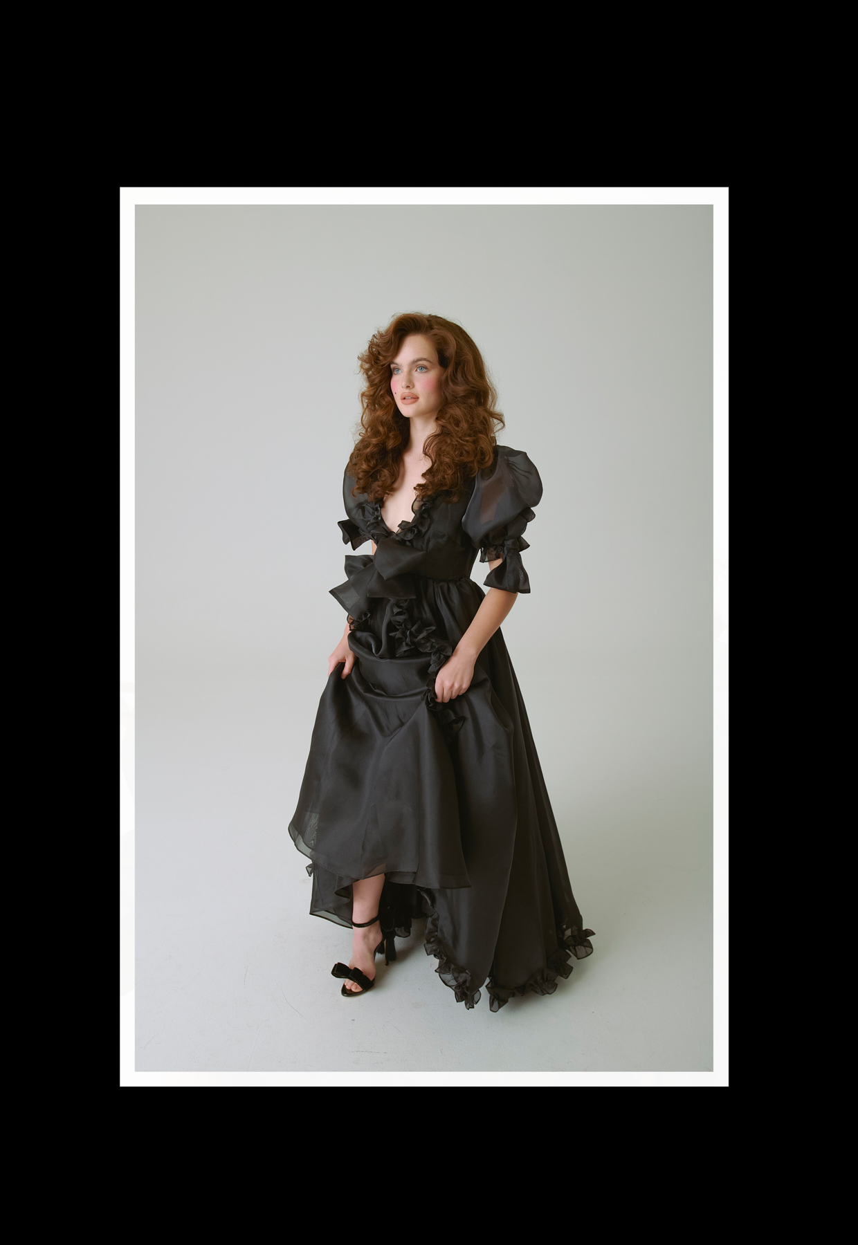 A delicate, romantic stunner with huge circle skirt and bow garnishes all over!